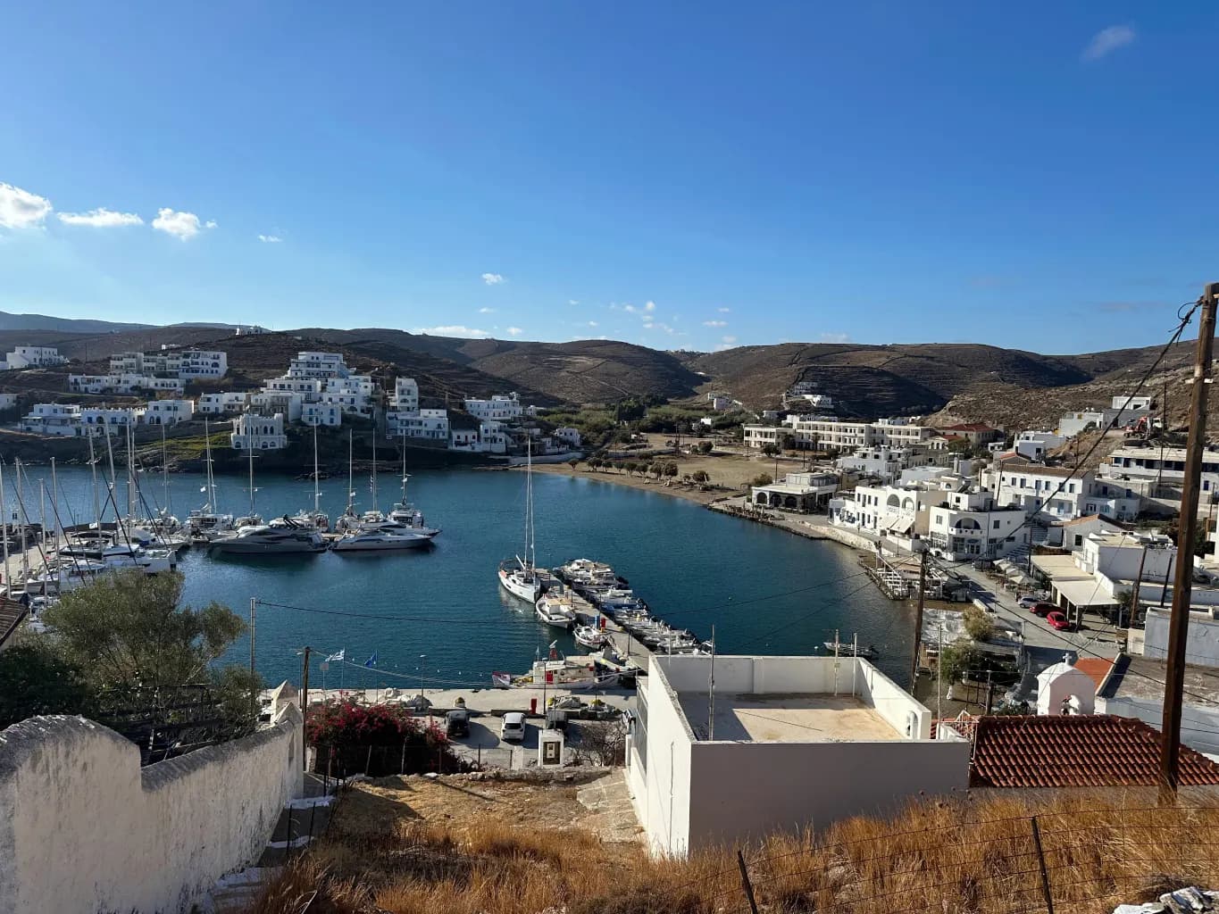 Whitewashed island village around a harbour